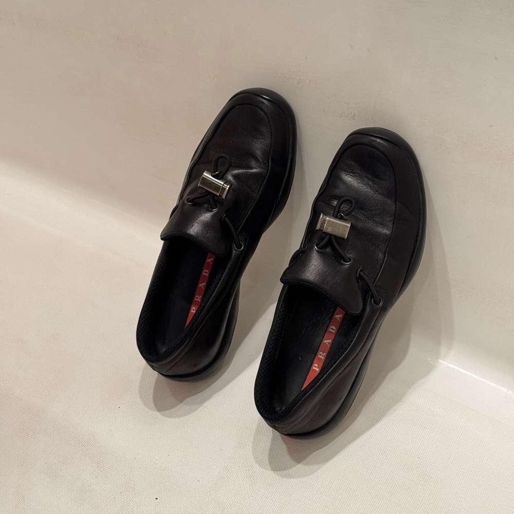 Prada Black Leather Slip-On Loafers with Silver Hardware - Picture 6 of 7